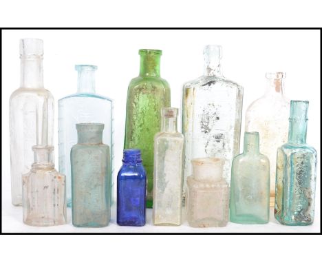 A group of 12 vintage medicine bottles including Fennings, Reed of Ilfracombe, Daddies Sauce, Congreve's Balsamic Elixir and 