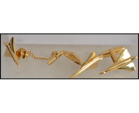 A pair of gold plated Concorde gents cufflinks. In the original presentation box complete with the matching tie pin and chain