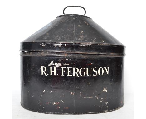 A large military black painted metal hat box with hinged internal fittings by Fishers of Woolwich, London with owners name R 