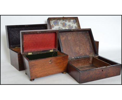 A good group of four Victorian tea caddy storage boxes one of mahogany construction in sarcophagus form. 