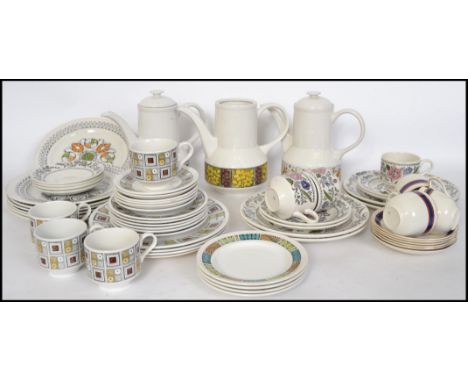 A good collection of Kathie Winkle ironstone pottery dinner wear to include Calypso, Rushstone and Mardi Gras pattern cups, s