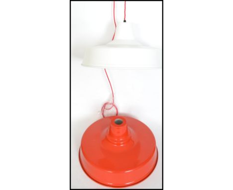 A pair of retro style ( different colours ) ceiling lights / shade in the manner of Poul Henningsen. The white fixture being 