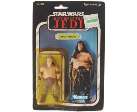 An original vintage Kenner made Star Wars carded action figure ' Rancor Keeper.' Figure mint, and still sealed on original ca