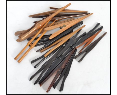 A collection of approx 20 Victorian and Edwardian vintage glove stretchers of typical form in ebony and other woods. Please s