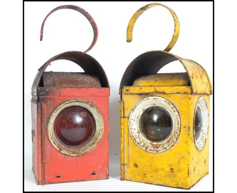 Two industrial road / railway 3 aspect hanging oil lamps complete with inner trays and original red glass panels one being a 