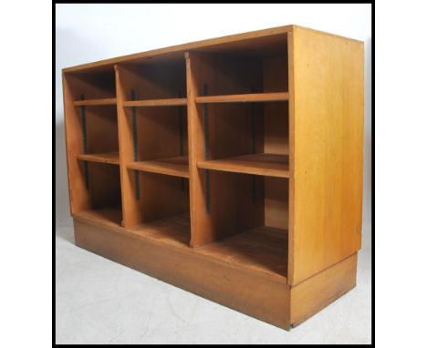 A large vintage 20th century wooden school open bookcase / shelving unit fitted with adjustable shelves. Measures 86cm high x