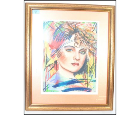 A framed and glazed limited edition mixed media pop art print of Madonna signed by artist J.Caldwell 87 2/50.