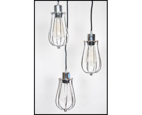 A set of three vintage industrial style droplet cage lights, each with fitted Edison Bulb, wire work cage, ceiling roses and 