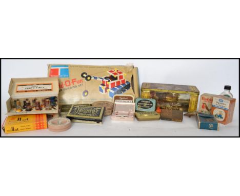 A large collection of advertising tins and wares. Many variuous makes, shapes and sizes to also include 2 unopened packets of