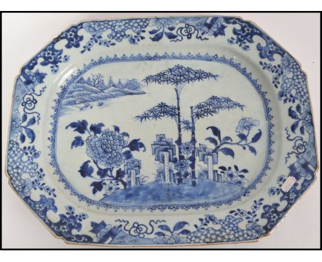 A believed 18th century Qianlong Dynasty Oriental European export ceramic blue and white large serving platter / plate. Measu