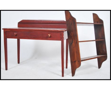 A Victorian style low mahogany side table with single drawer on squared legs together with a hanging wall shelf