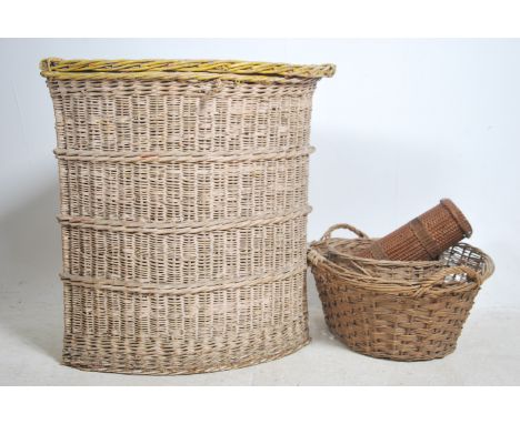 A collection of vintage 20th century whicker baskets of various styles 