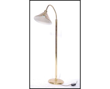 A collection of retro lamps to include a floor standing spot lamp with pendant shade and terraced base