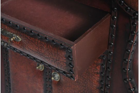 An Unusual Faux Leather Vinyl Studded Drawer Cabinet Unit Having A