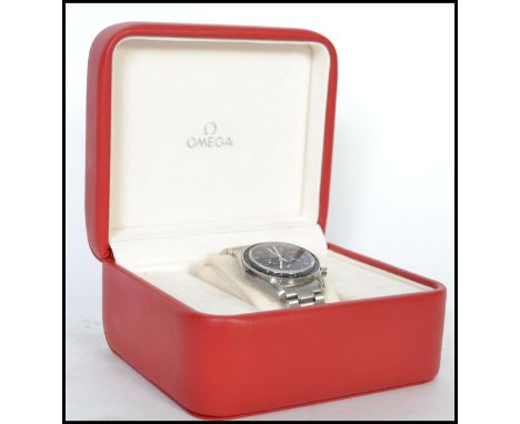 An Omega Speedmaster Professional Moon Watch stainless steel manual wind chronograph bracelet wristwatch. The circular black 