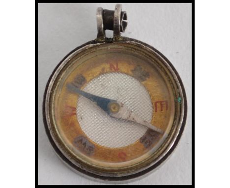 A small miniature hallmarked compass ( see illustrations )