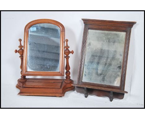 Victorian mahogany toilet swing mirror together with another mahogany wall hanging mirror of square form with thin shelf unde