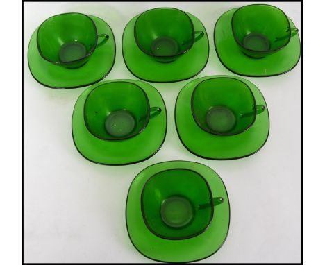 A retro / 1970's 6 piece French green glass part tea set comprising cups and saucers marked for Vereco.