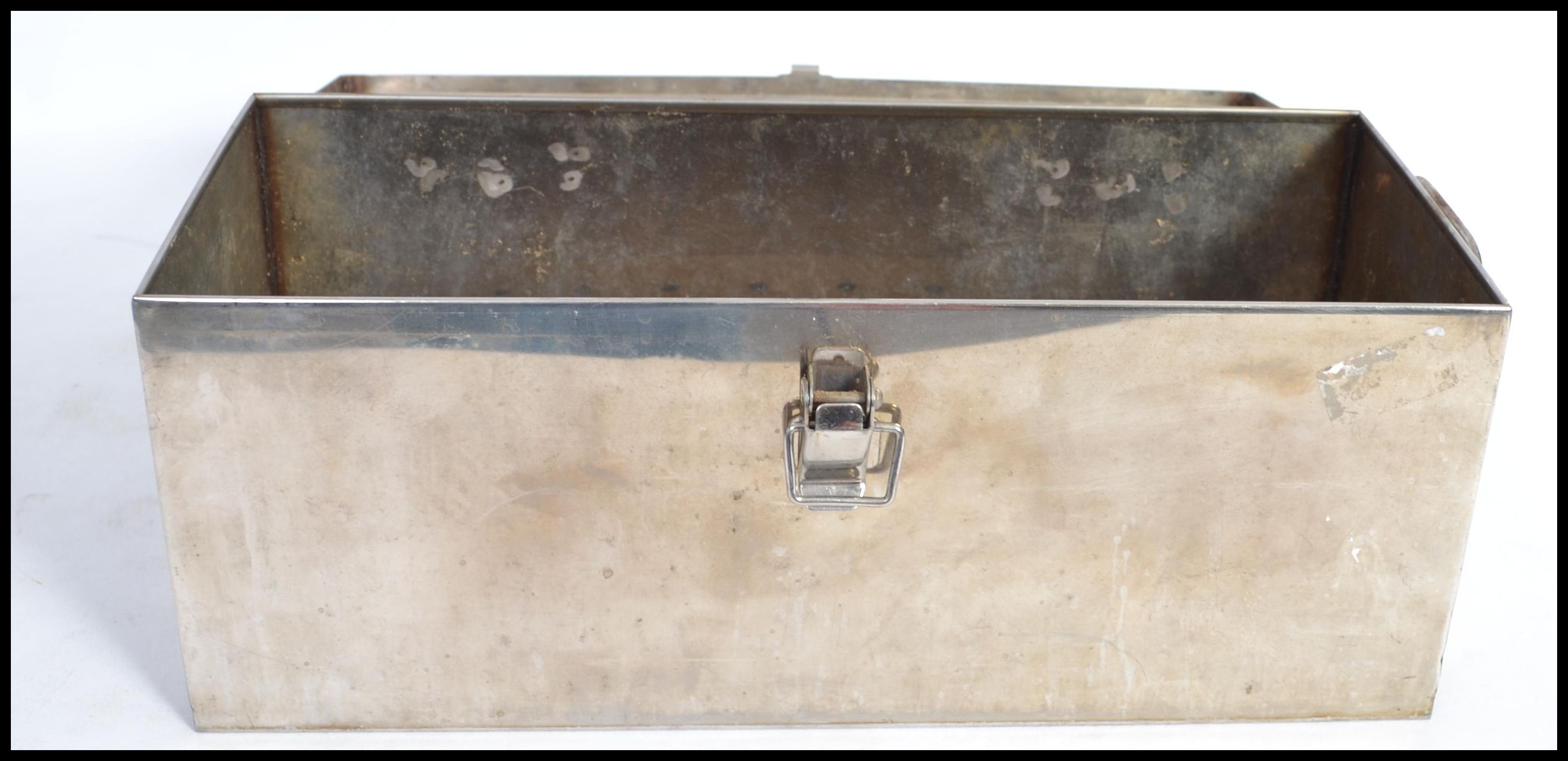 An unusual stainless steel box, with Oriental characters to cover