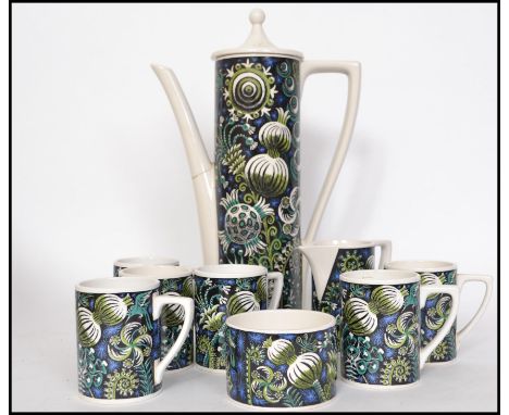 A retro 20th century  Portmeirion ' Magic Garden ' coffee service comprising tall coffee pot together with cans and saucers. 