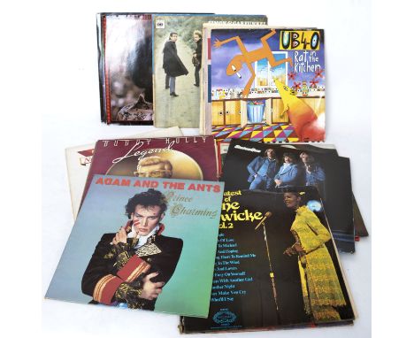 A collection of long play vinyl records to include several artists such as UB40, Manfred Mann, Adam And The Ants, Wings, Quee