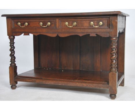 A Victorian  19th century Jacobean revival barleytwist side table desk having lower gallery shelf with twin drawers and flare