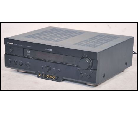 A Yamaha DSP AX620 Black NOir AV Amplifier complete in the original packaging.