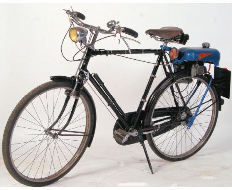 A rare c1950 Trojan Mini Motor powered Raleigh bicycle autocycle. The engine 49cc. In original condition, and the vendor assu