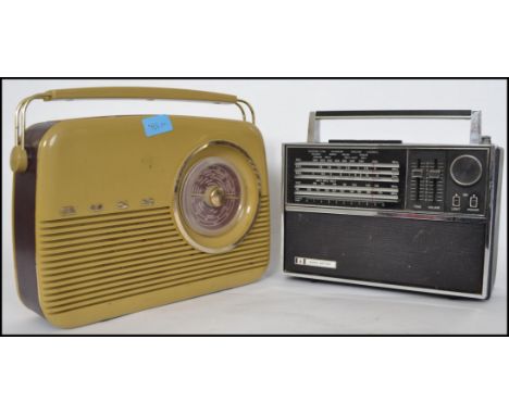 A vintage mid century Bush All Multiband portable radio with push button and dial facia together with a Bush green radio