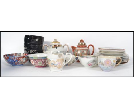 A group of Oriental ceramics to include various cups and saucers, teapots, Imari Bowl etc. Please see images.