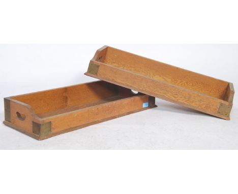 A fabulous pair of Victorian oak library tray with bracket work joints and dovetailing having gallery sides with pierced hand