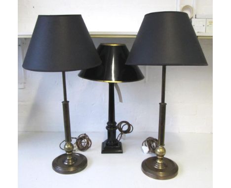TABLE LAMPS, a pair, in brass 73cm H and another black and gilt table lamp. (3)
