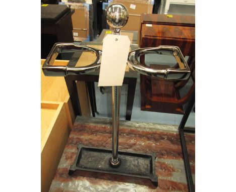 STICK STAND, chrome, with black metal base, 59cm H x 35cm W. 