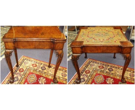 CONCERTINA ACTION CARD TABLE, 19th century, George II manner walnut with eighteenth century needlework lined playing surface 