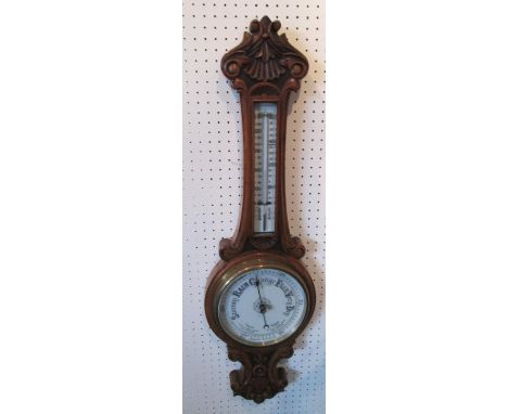 ANEROID BAROMETER, late Victorian, carved oak, 87cm H x 27cm W. 