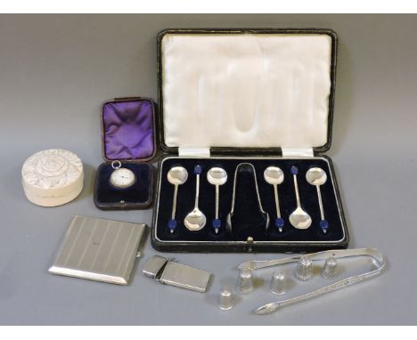 Five silver thimbles, a needle case, a pair of silver sugar nips, a cigarette case, a cased set of coffee spoons, a cased bar