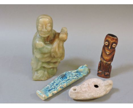 A Chinese soapstone figure 15.5cm, a ushabati 15cm, a clay lamp 10cm, and an African pipe, 11.2cm