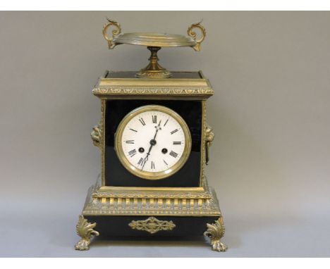 A 19th century French gilt and ebonised mantel clock, 49cm high