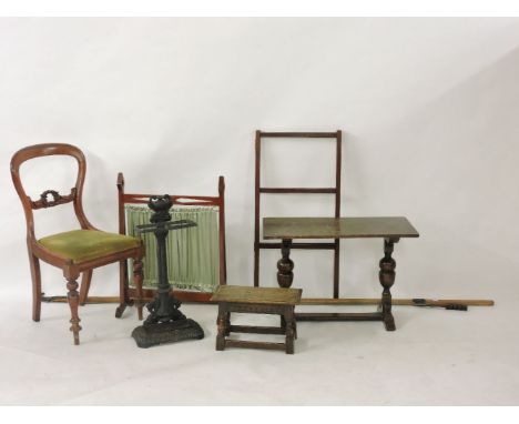 A Victorian mahogany balloon back single chair, an oak table, an oak stool, a towel rail, a fire screen, a branch lopper, and