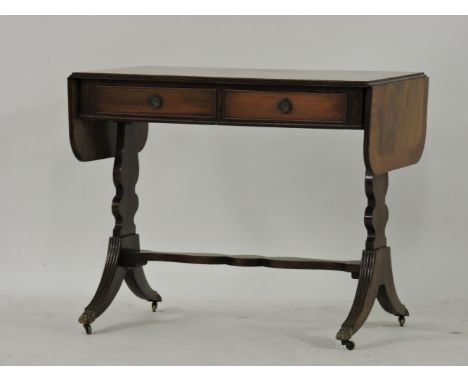 A reproduction mahogany sofa table, 91.5cm wide, 75cm high, 55.5cm deep