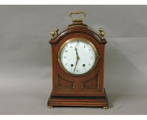 A mahogany and gilt mounted mantel clock, with a convex enamel dial, 36cm high