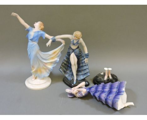 A Goldscheider figure of a girl in a crinoline dress, modelled by Dakon, damaged, and two further ladies