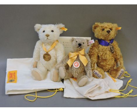 Three modern Steiff mohair teddy bears, including Millennium, Golden Jubilee, and a small cream example