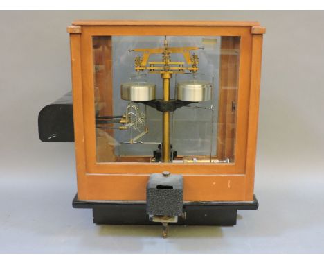 A Stanton 'Synchro Release' brass chemical scale, and an Oertling 'Release-o-matic' chemical scale, two boxes of brass weight