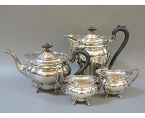 A four piece silver tea service, Birmingham 1928/1937, water jug 22cm high, approximately 52oz