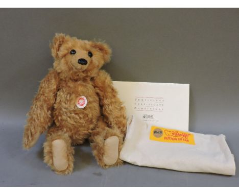 A modern Steiff brown mohair teddy bear, in dust bag, with certificate