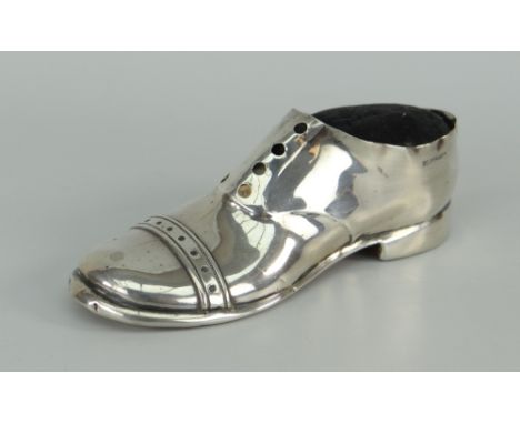 SILVER MOUNTED PIN-CUSHION OF SHOE-FORM modelled with lace-holes, brogue toe-cap, wooden sole, Registration Number 54891S for