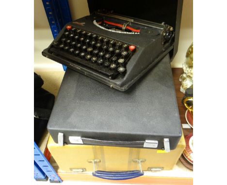 THREE VINTAGE CASED PORTABLE TYPEWRITERS including Hermes 2000, Empire x 2