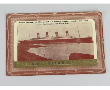 EARLY TWENTIETH CENTURY POSTCARD FOR SS TITANIC in sepia with title in gold foil, specifications and lives lost detailed abov