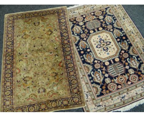 VINTAGE SILK PERSIAN RUG with purple and pale green decoration, 176 x 116cms, together with an Iranian handmade woolen rug, m